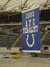 Bill B. Adjusts Colts banner before flight